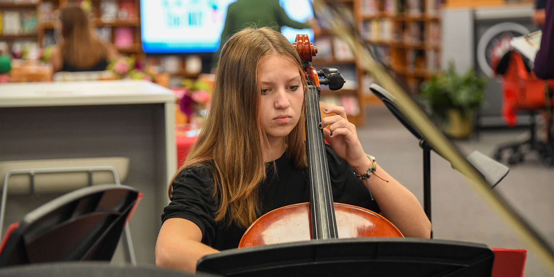girl playing a cello