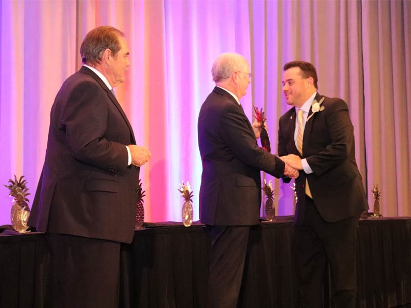 GCS FANS Director Joe Urban accepts the award from John Durst, President and CEO of the SCRLA and Bobby Williams, Chairman of the Board for the SCRLA and owner of the Lizard’s Thicket restaurants.