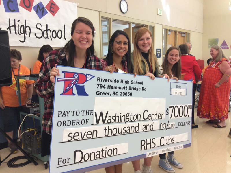 Riverside High School brought a bus load of students and a giant check to the Washington Center.  
