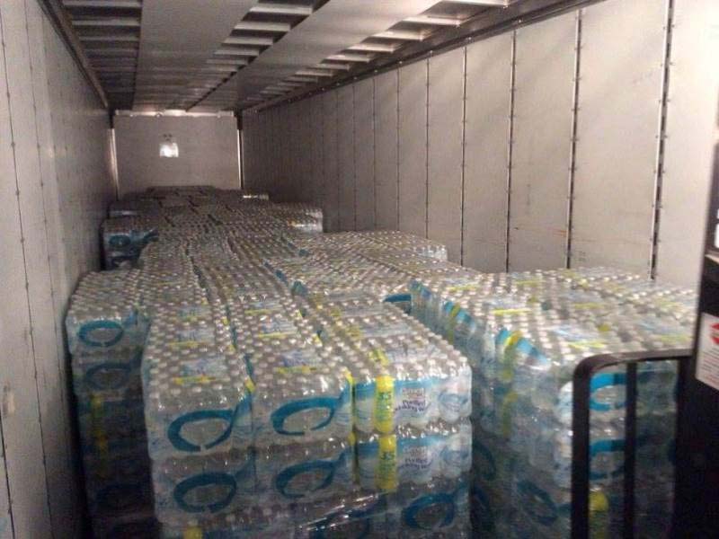 Truck load with cases of bottled water