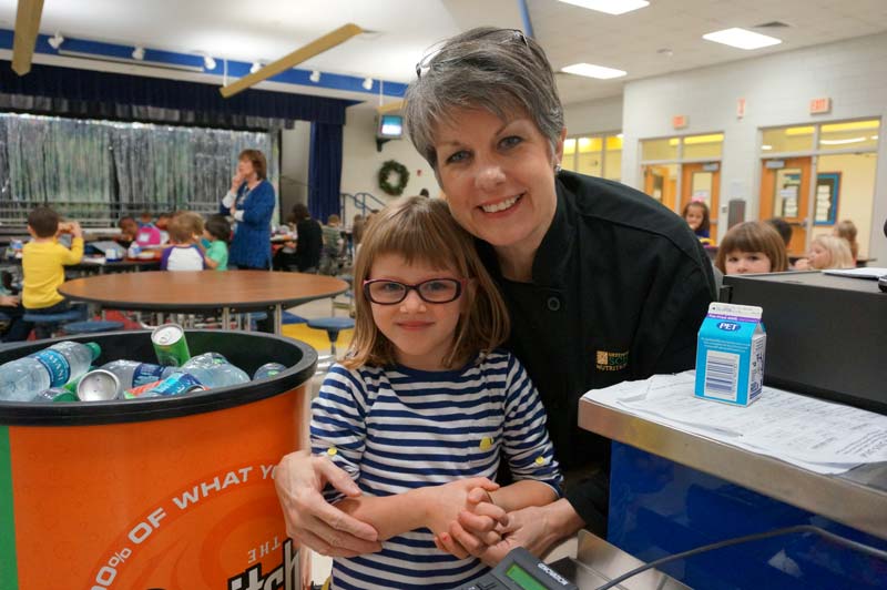 Paris Elementary Cafeteria Manager Jacque Holliday with female student