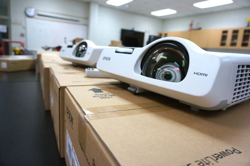 The new projectors replace aging Promethean Board projectors that are beyond repair and have exceeded their warranties. 