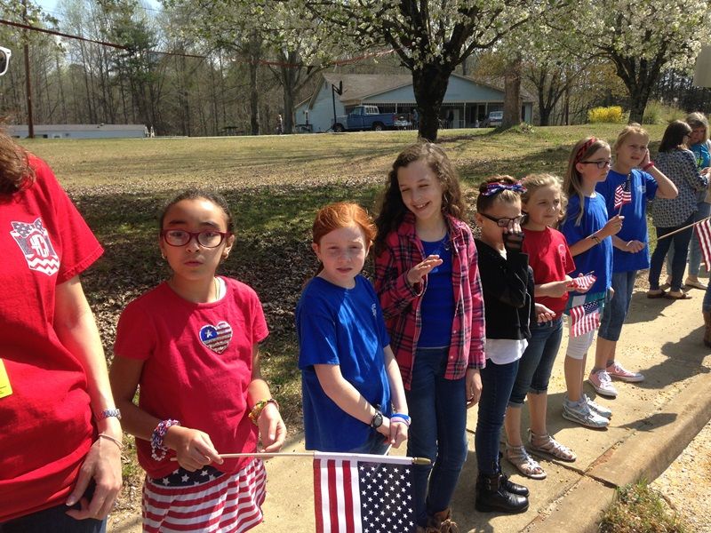 Heritage Elementary students show their respects to Officer Jacobs.-3