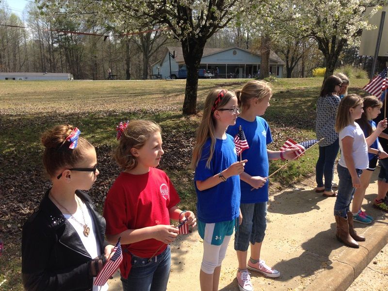 Heritage Elementary students show their respects to Officer Jacobs.-4