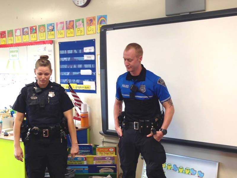 Earlier this year Officer Allen Jacobs visited with first graders in Mrs. Kraning's class at Augusta Circle Elementary.-3