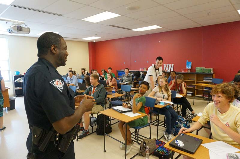 “I treat students just like they’re mine. We are all a big family here,” said Officer Robert Attaway, SRO at J. L. Mann High Academy.