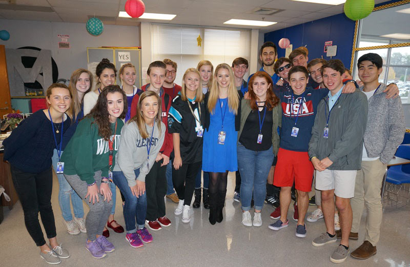 Rachael Weisinger, center, pictured with her students.