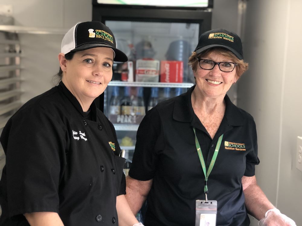 2 lady food service workers
