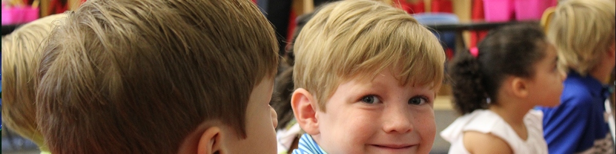 Elementary boy smiling at camera