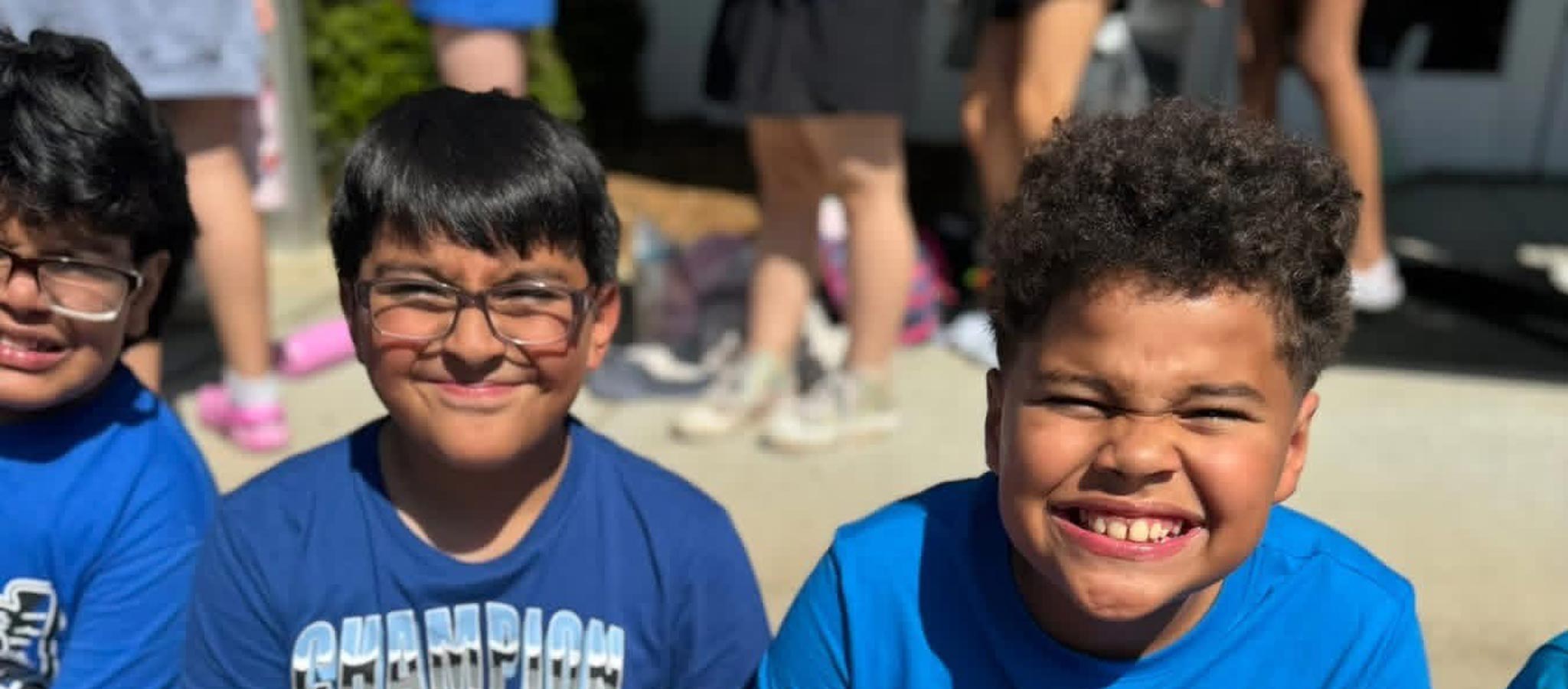 3 smiling boys