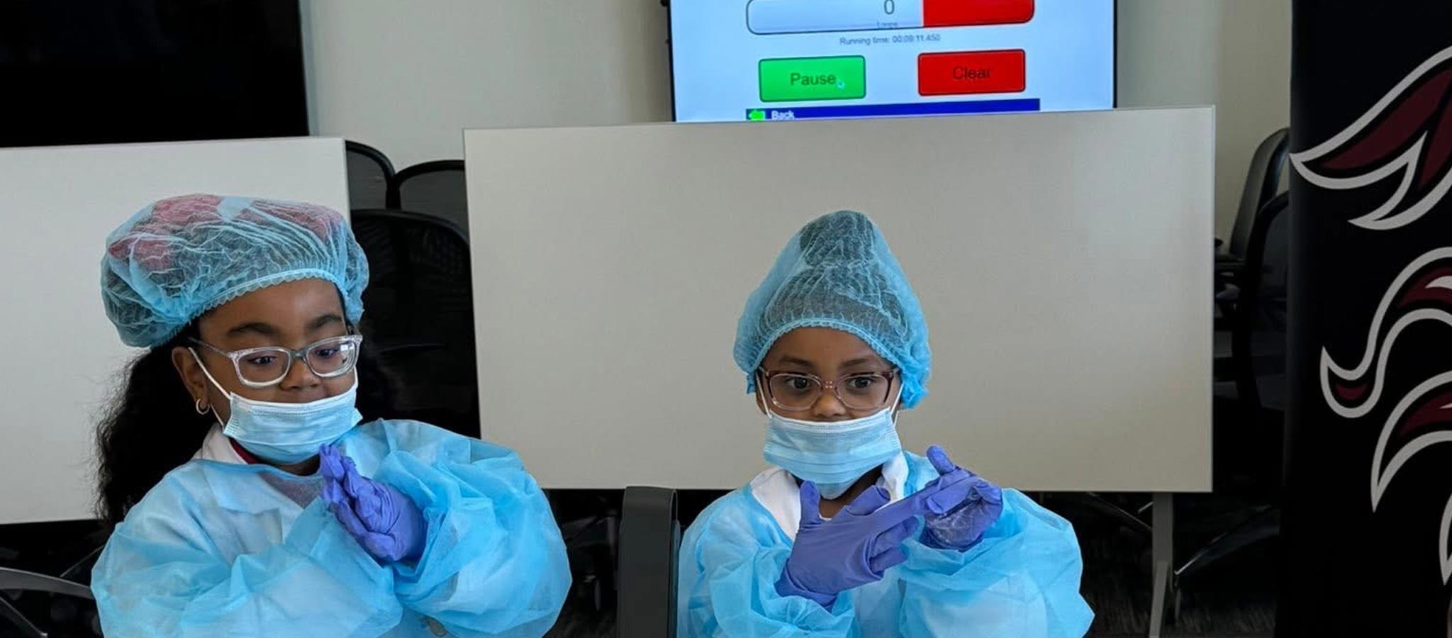 students wearing medical attire