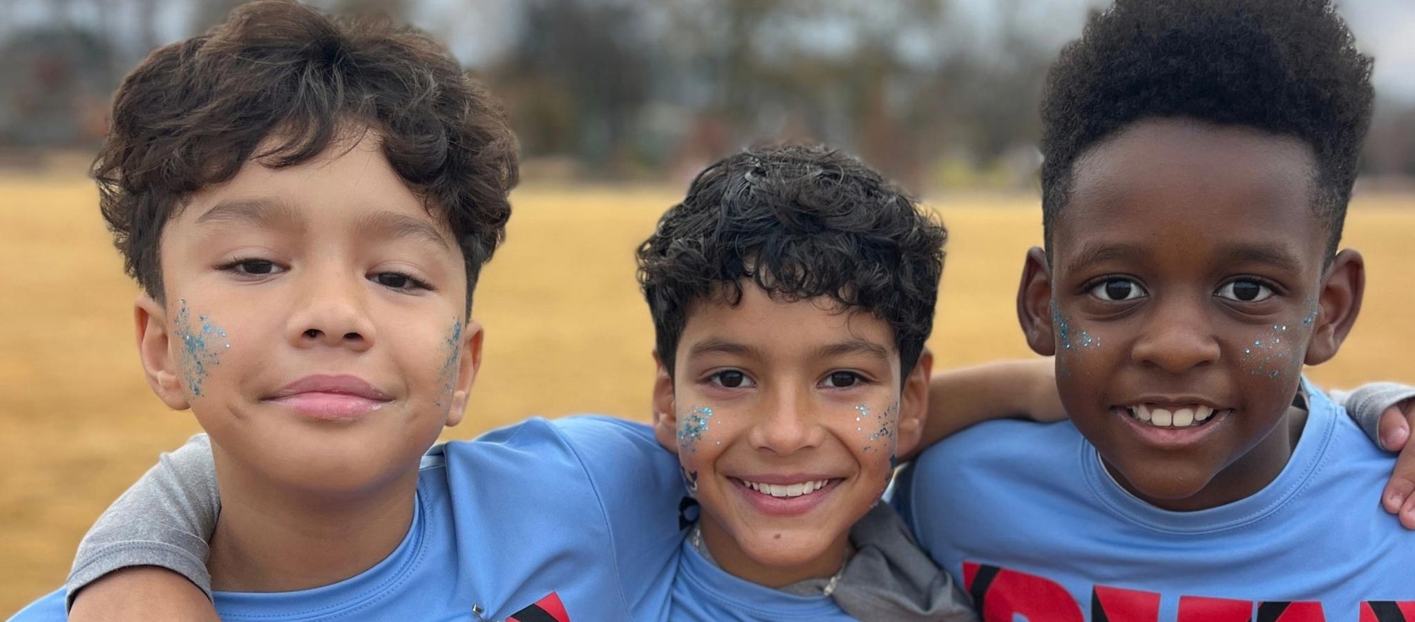 3 boys outside