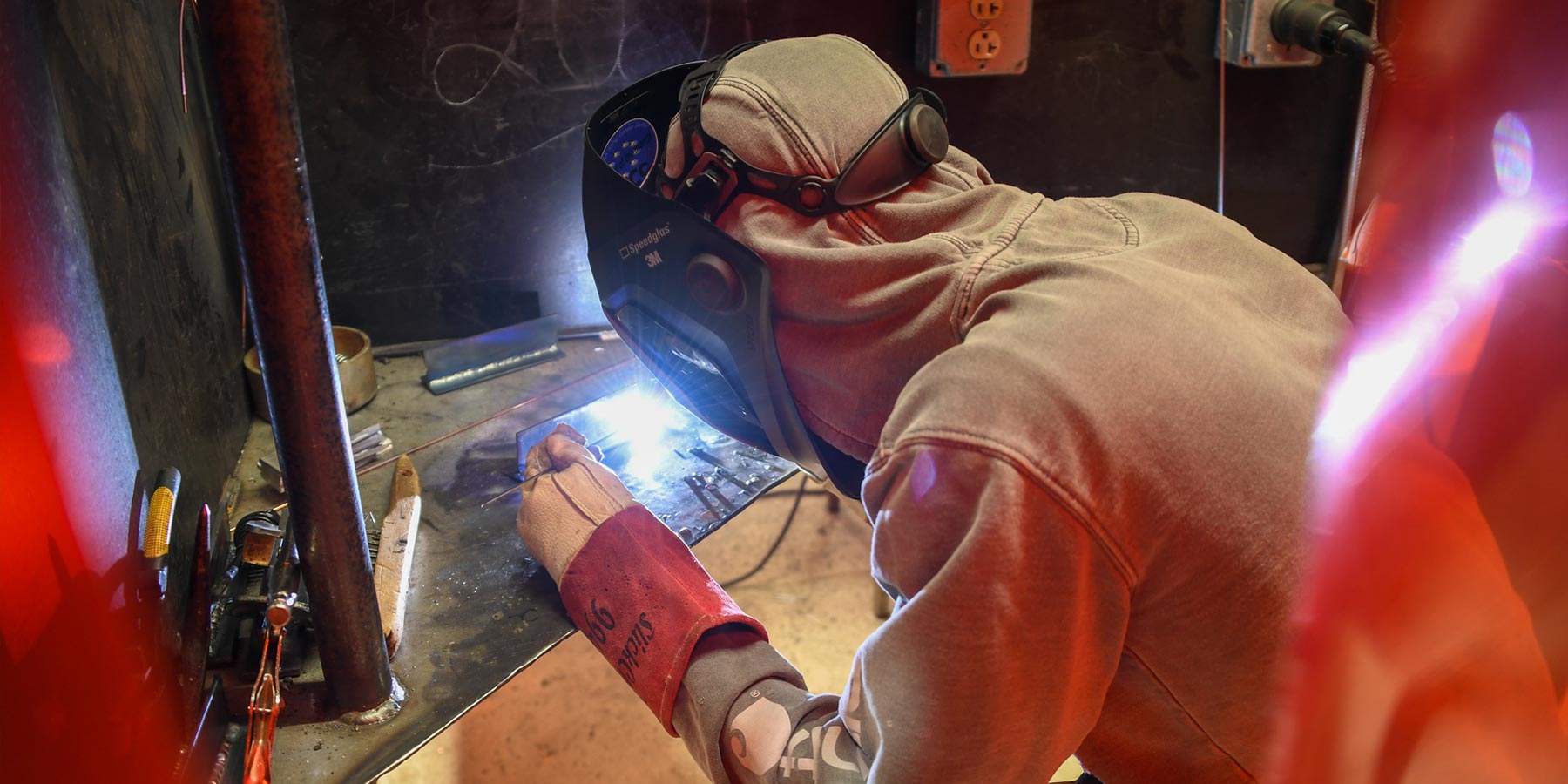 student welding something