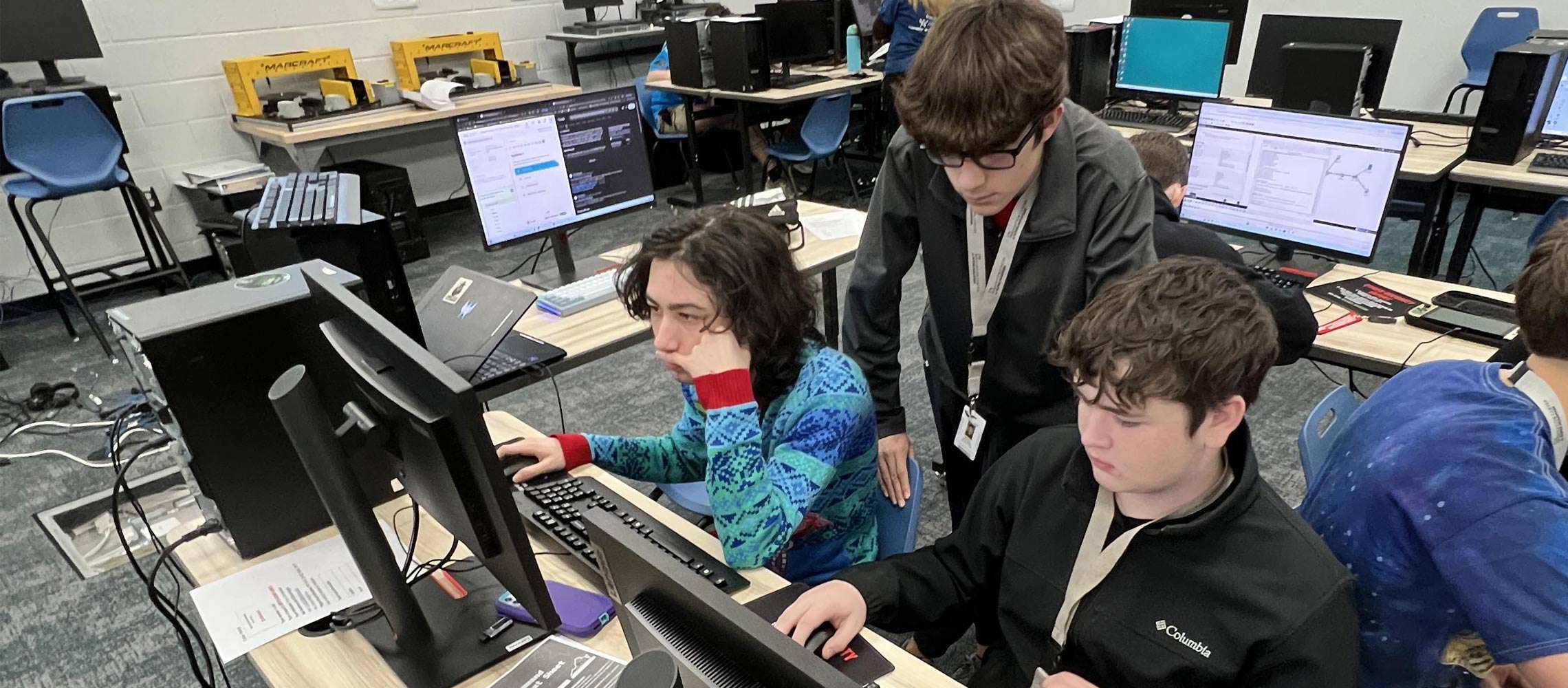 students looking at computers