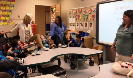 Students at Washington Center at Hollis (Teachers Kim Poole and Sharon Russo) celebrate Converse Shoes’ 100th Anniversary with a lesson and a Converse winning shoe sole gripper competition.  