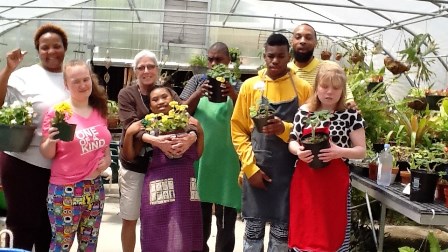 Washington Center students and staff display the plants and flowers for sale to the public during the school’s annual Greenhouse Sale. 