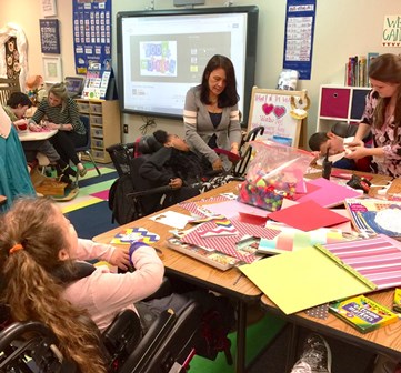 Washington Center students and staff create Valentine cards to deliver to their friends at Shepard’s Care Assisted Living Center.