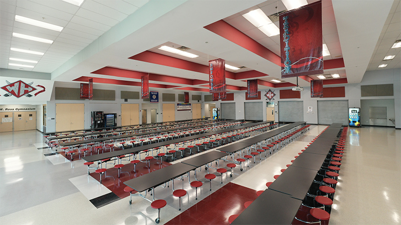 view of cafeteria tables